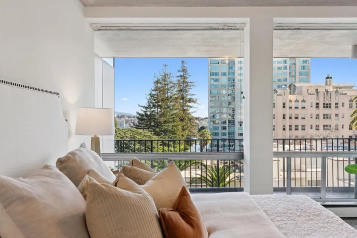 Bedroom featuring a city view