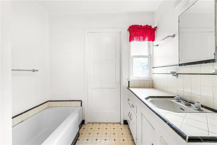 Full bath with separte tub and shower stall.