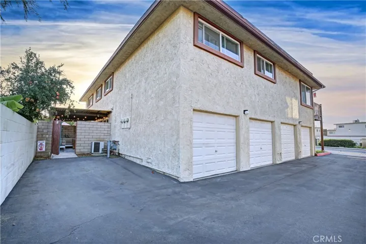 One Car Attached Garage plus the assigned open car space.