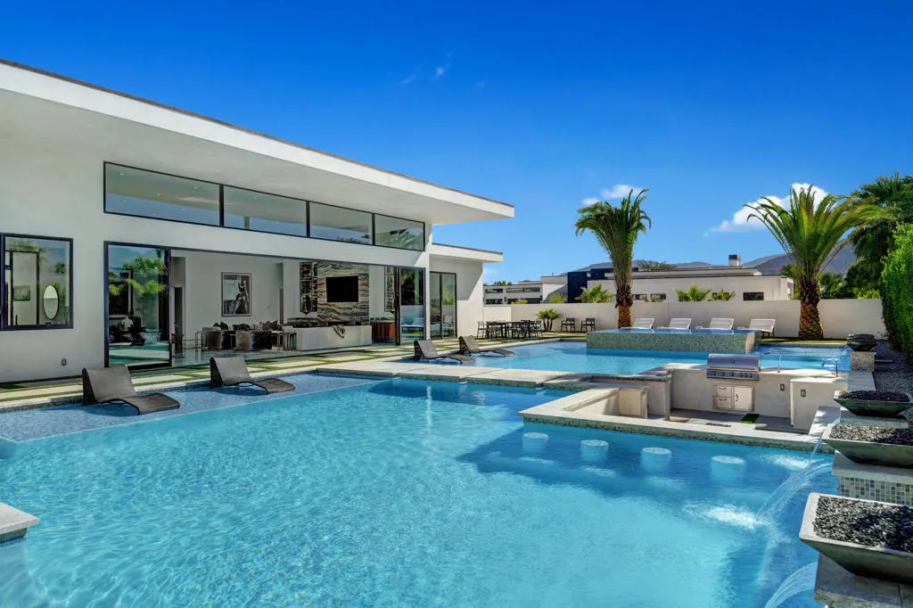 POOL AND SUNKEN BBQ PIT TO HOUSE