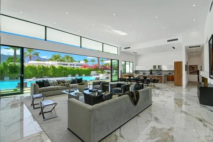 LIVING ROOM ANGLED TO DINING ROOM AND PO