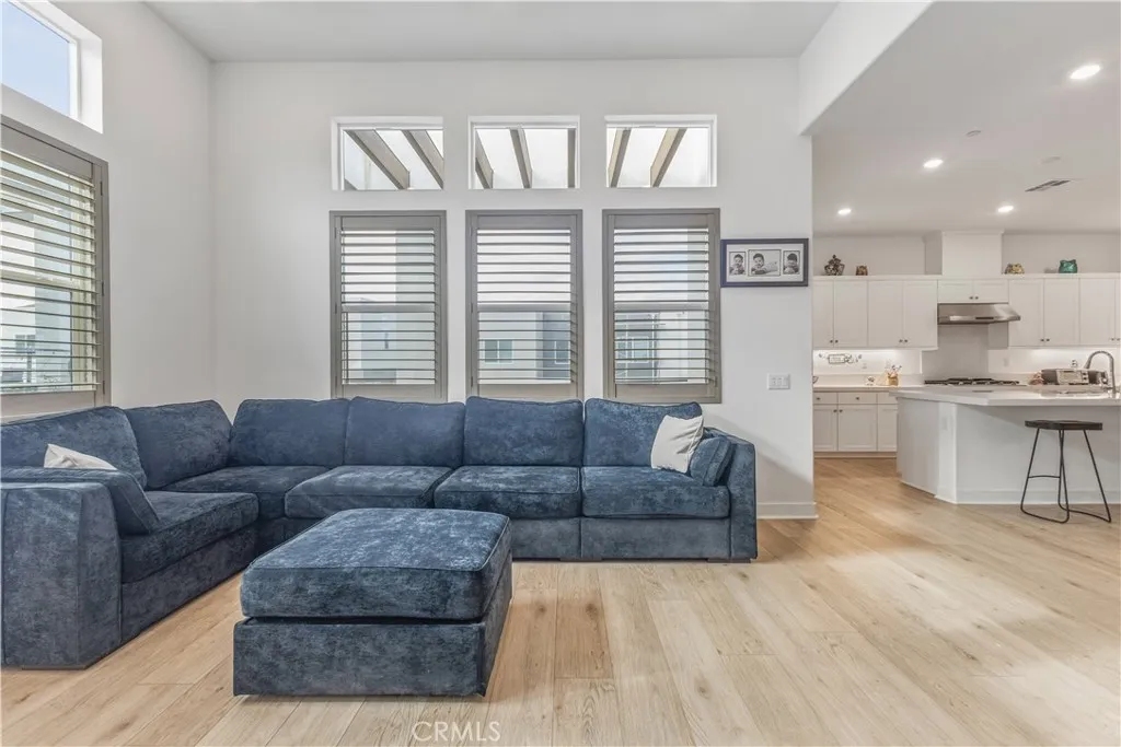 Living room with balcony behind