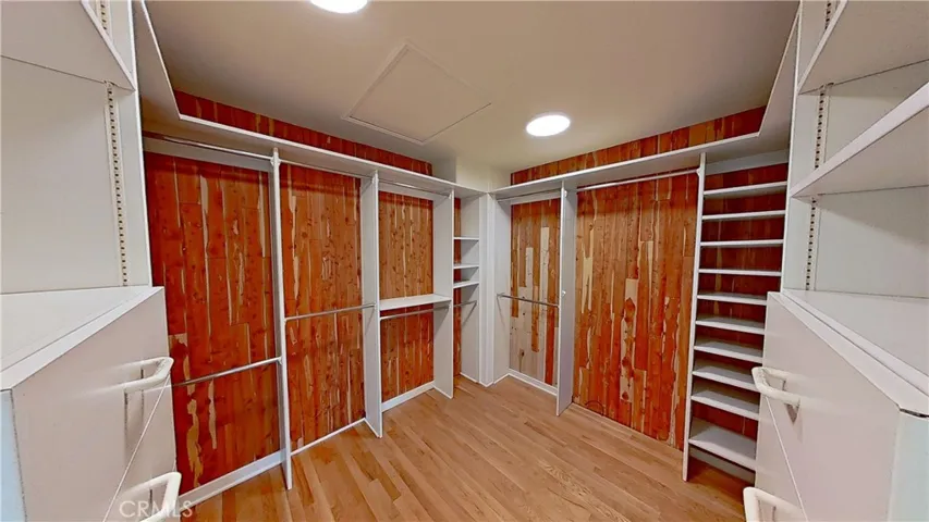 Walk-in closet in Primary Suite