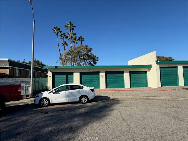 Storage units 1-5 with easy access and clear "For Rent" signage, featuring a clean and secure exterior.
