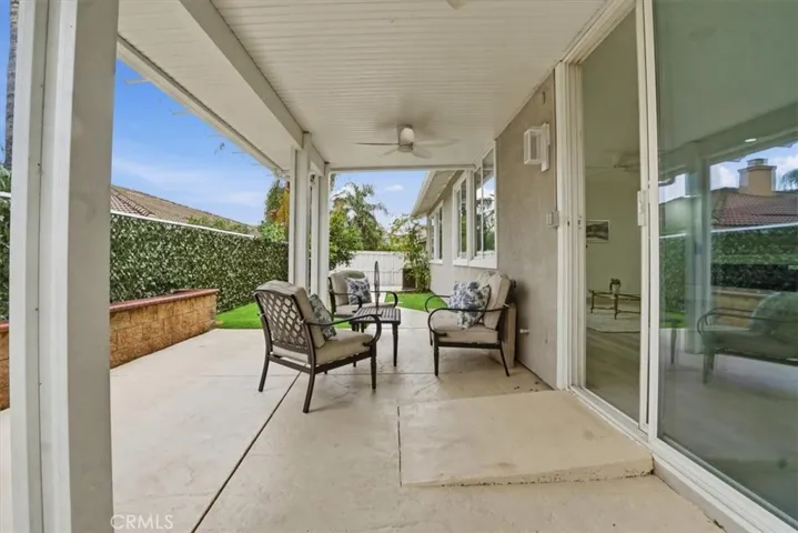 BEAUTIFUL COVERED PATIO WITH CIELING FANS