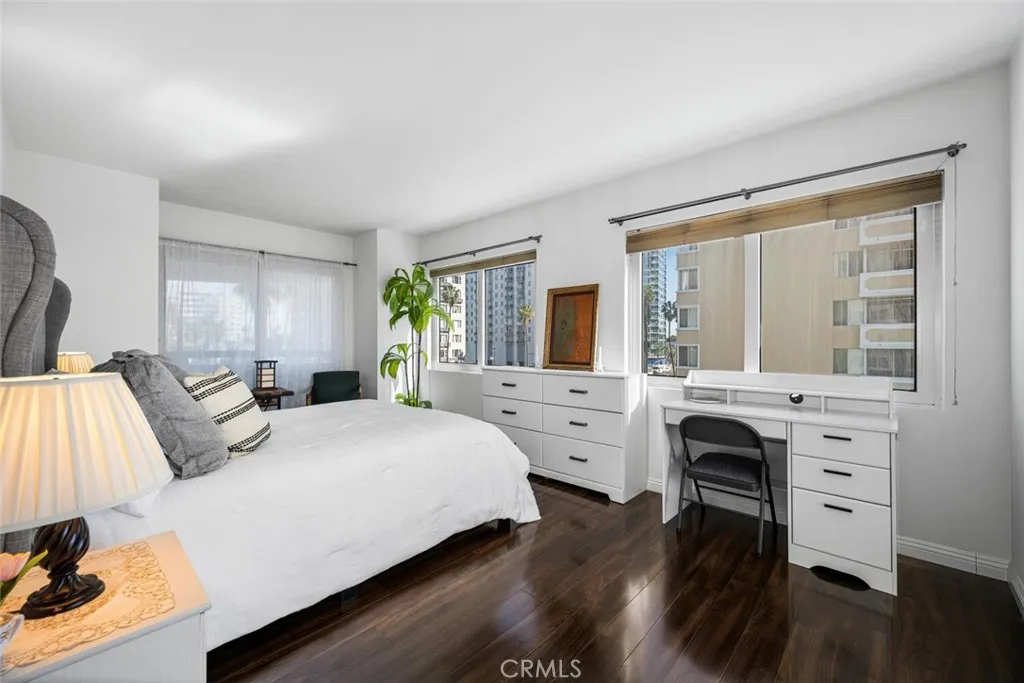 A second balcony situated immediately to the left in this photo with city views; even views down Ocean Blvd. to the iconic Villa Riviera.