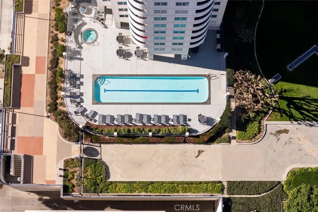 For perspective, this pool is generous in size. You'll also enjoy access to a jacuzzi, grilling area, and fire pit, as part of your robust amenity package.