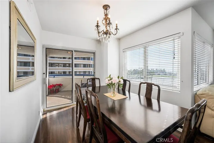 Dining room functions can easily extend to the balcony for an indoor/outdoor experience.