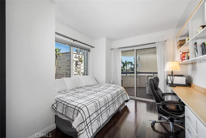 The second bedroom with a bright Northern exposure, offers superb city views and can easily be adapted to be a work from home office space.