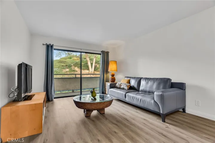 Open floor plan looking to living room and patio