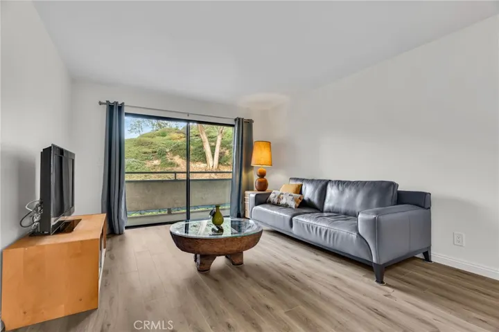 Open floor plan looking to living room and patio