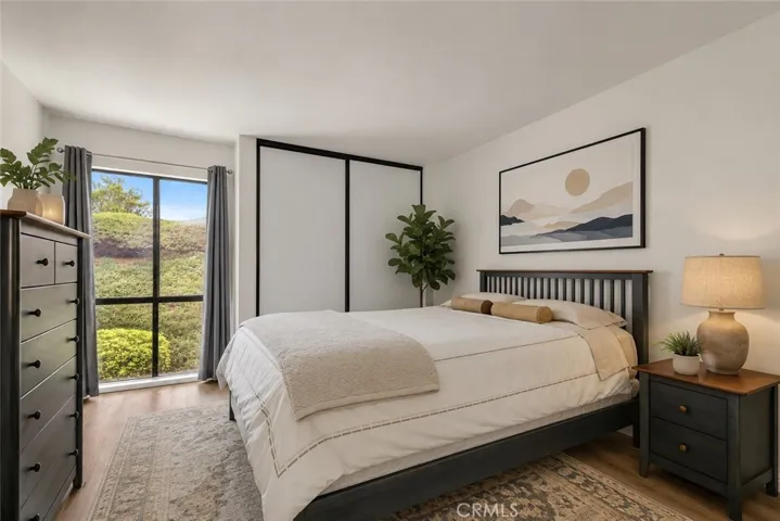 Bedroom w incl furniture (rug, plants and art virtually staged)