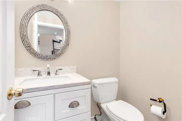 The downstairs half bathroom also has an upgraded vanity area.