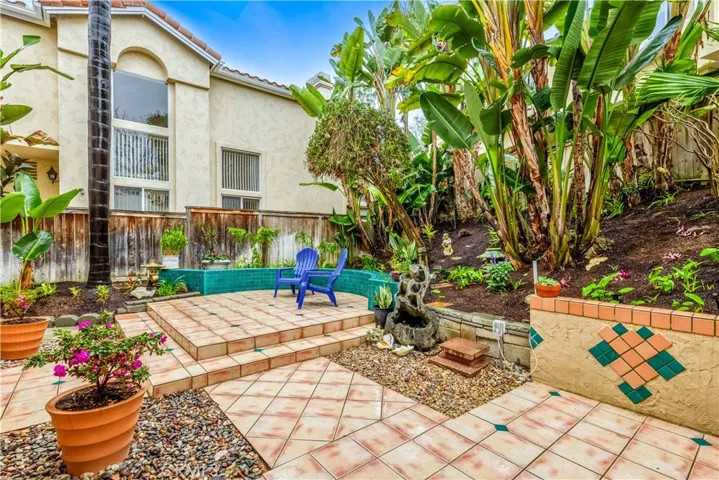 Another view of the tropical landscaped backyard.