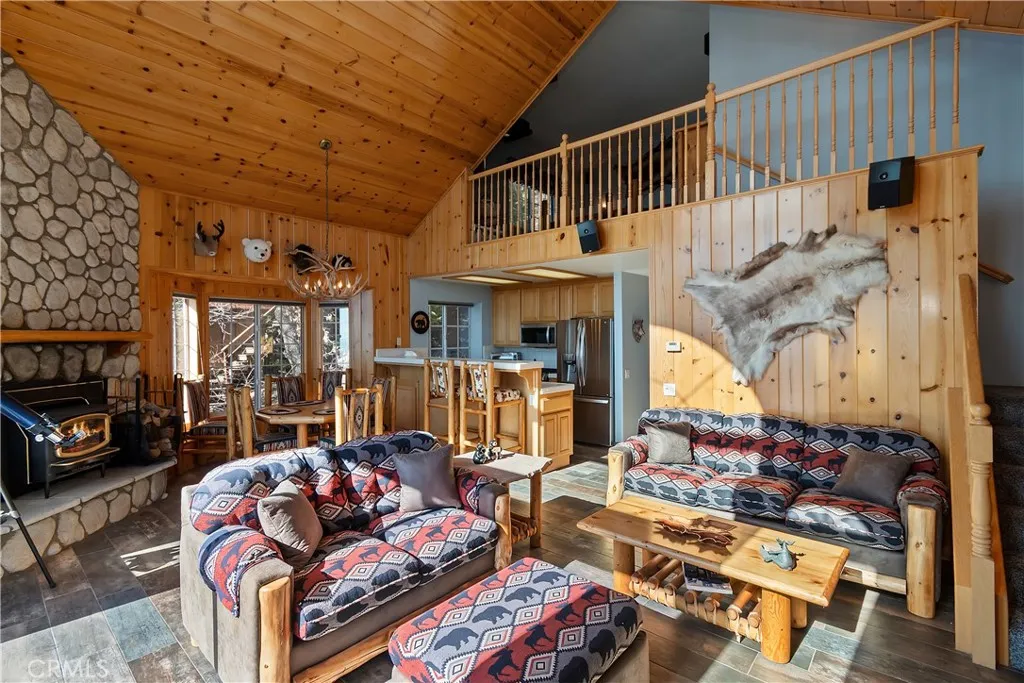 Living Room, Dining Area, Breakfast Bar, And Kitchen

Fire in fireplace has been digitally added