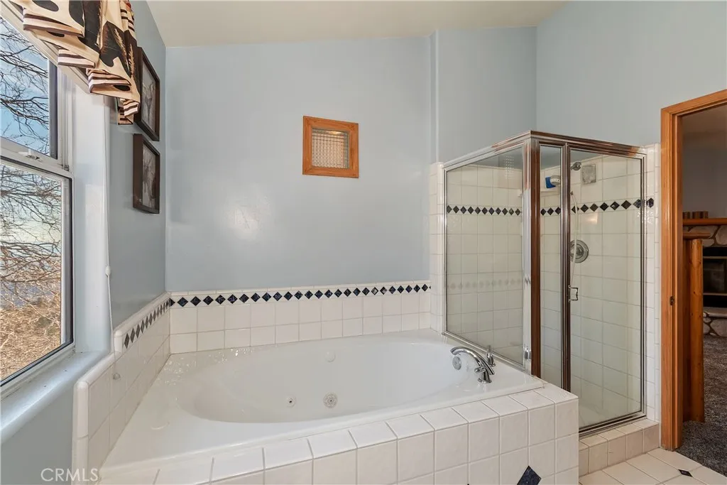 Primary Bathroom With Jetted Tub, And Separate Shower