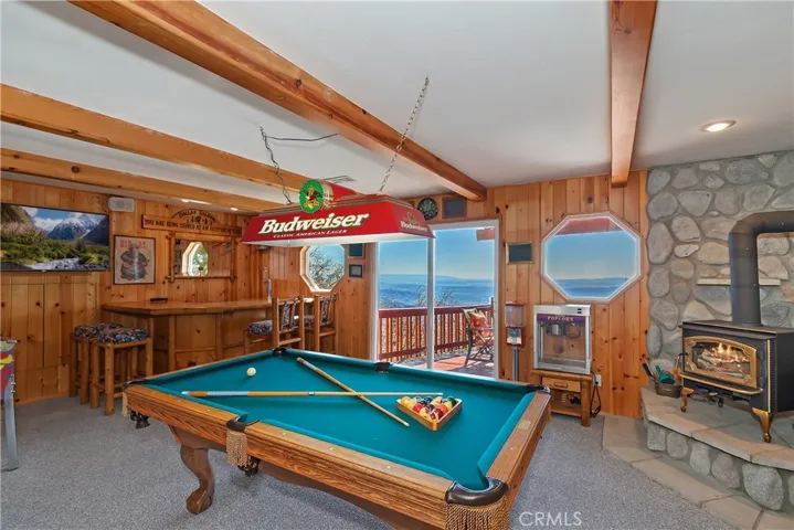 Bottom Level Game Room

Fire in fireplace has been digitally added