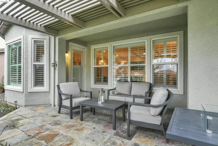 View of patio / terrace with an outdoor living space and a pergola