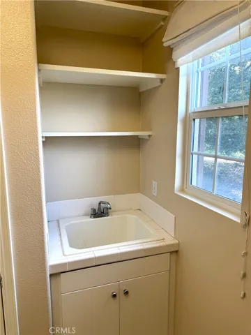 Laundry Room Comes with a Sink & Light from Window.