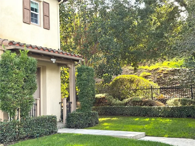 Side of Front Yard. Beautiful Scenery.  You are next to a Nature Preserve with Walking & Biking Trails.