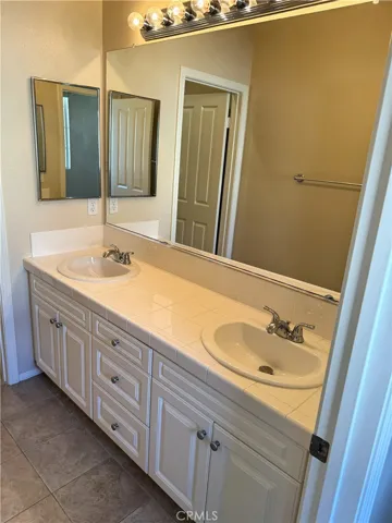 Upstairs Hall Bath.  Dual Vanities.