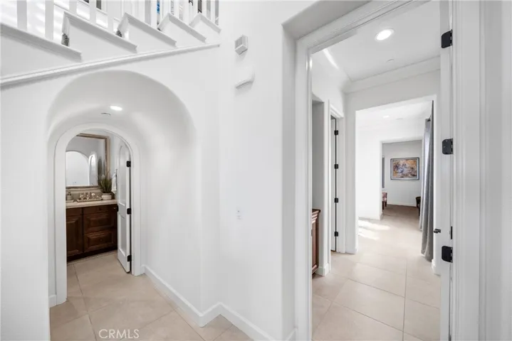 Entry to downstairs half bath, secondary primary to the right.