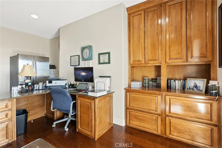 Finished office w/built-ins.  May use as lounge