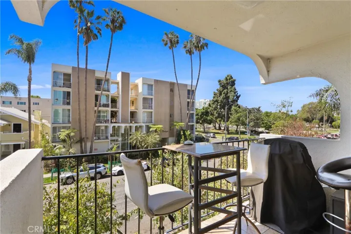 Spacious private balcony offering cool ocean breezes and a perfect spot to unwind.
