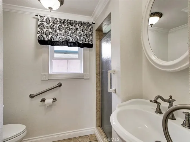 First bathroom with stans up shower