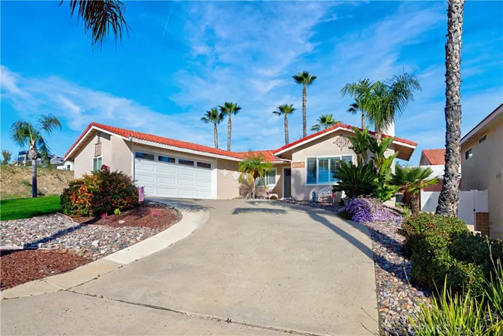 Long driveway with lots of room for cars.