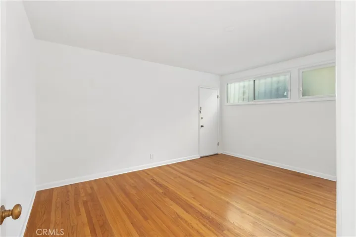 Hardwood floors in the bedroom.