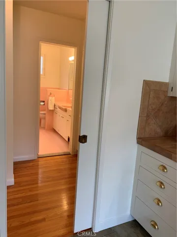 Pocket door from kitchen to hallway.