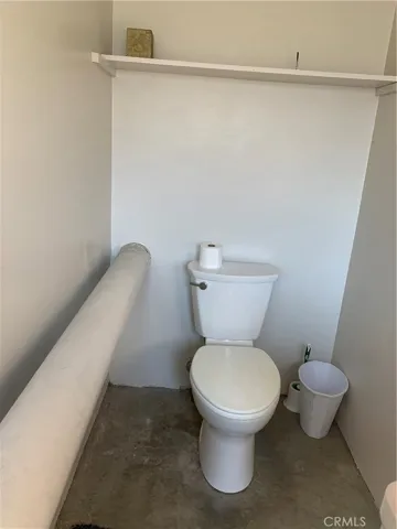 Half bath in the community laundry room.