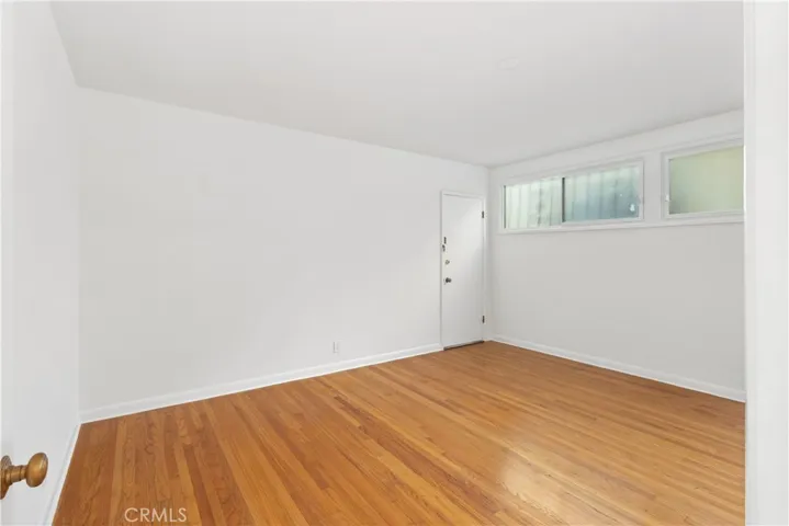 Hardwood floors in the bedroom.