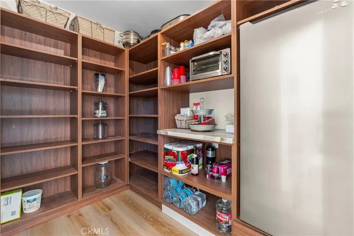 walk in pantry with refridgerator