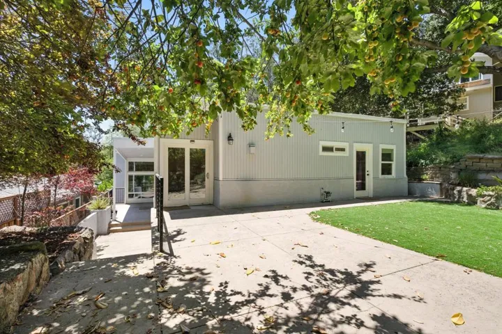 Back of house with a patio area and french doors