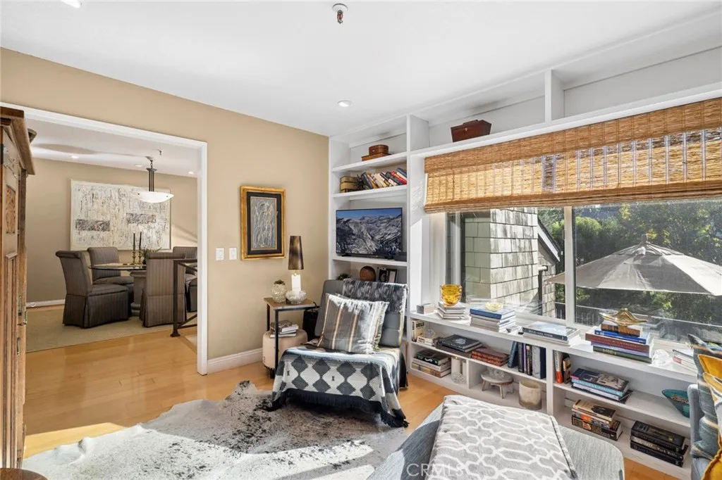 Den (or potential 3rd bedroom) overlooks the deck with some golf course views