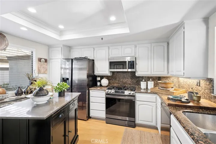 Bright kitchen with ample counter space and storage