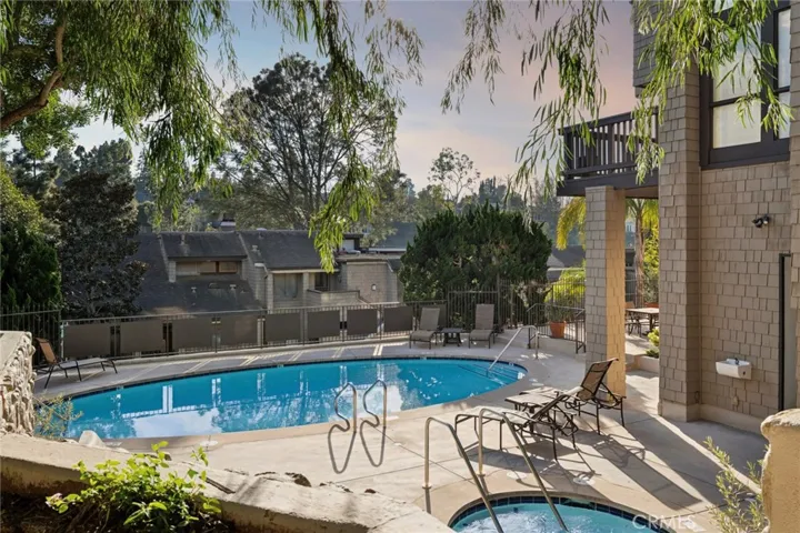 Charming pool, jacuzzi and sun bathing area.