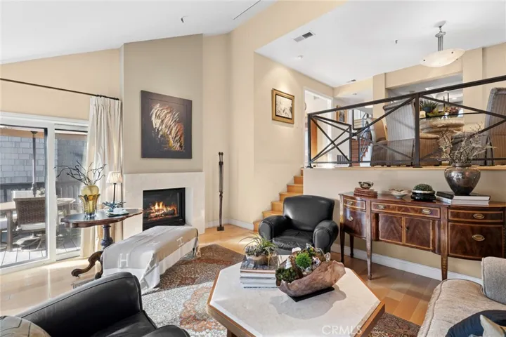 Living Room is anchored by a floor-to-ceiling fireplace