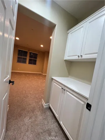 hallway storage and master bedroom