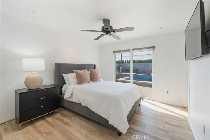 Primary Bedroom with slider leading to the pool/spa