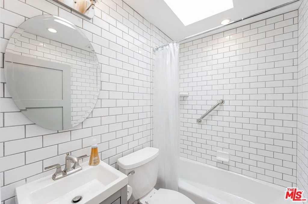 ONE OF TWO BATHROOMS UPSTAIRS