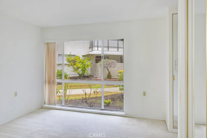 Another view of the primary bedroom.