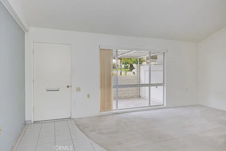 Living room view looking towards the front door.