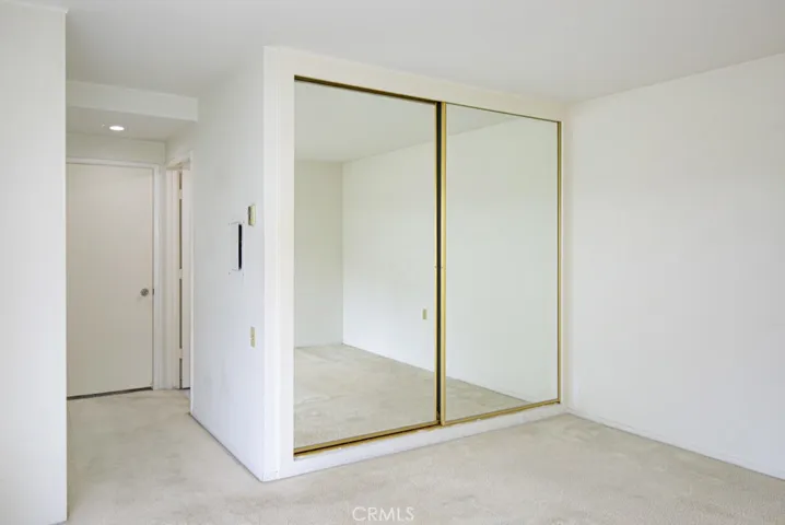 Another view of the primary bedroom.