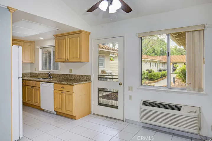 Another view of the dining area looking towards the kitchen.