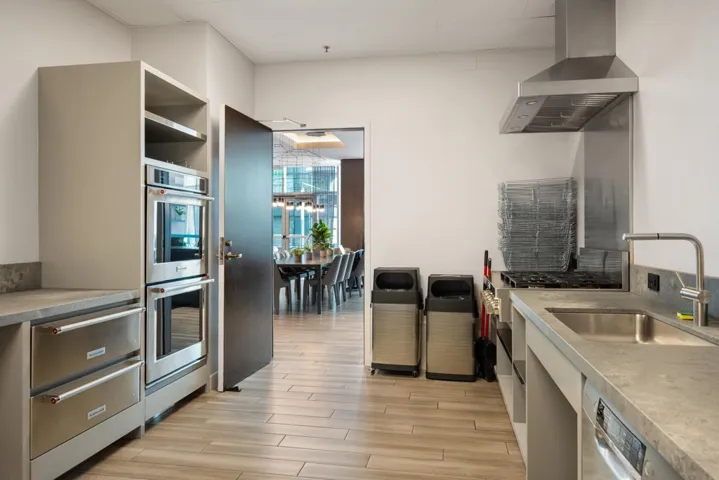 Updated clubhouse with interior and exterior access for large events. Large kitchen with food warmers, appliances, ample counter/bar with ice machine, sink, and seating for meetings and celebrations. A Reservable movie theater on the same floor seats 30.