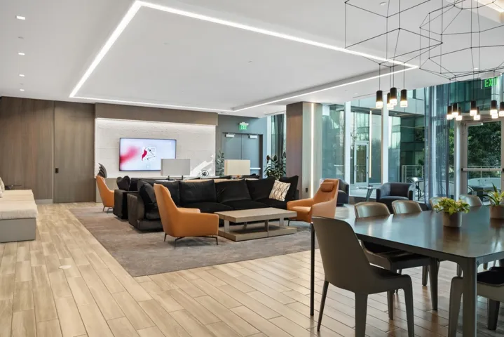 Updated clubhouse with interior and exterior access for large events. Large kitchen with food warmers, appliances, ample counter/bar with ice machine, sink, and seating for meetings and celebrations. A Reservable movie theater on the same floor seats 30.