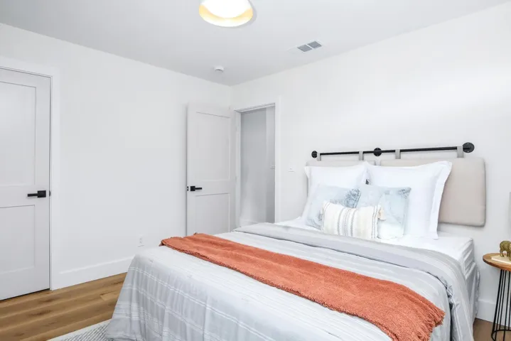 Bedroom with wood finished floors